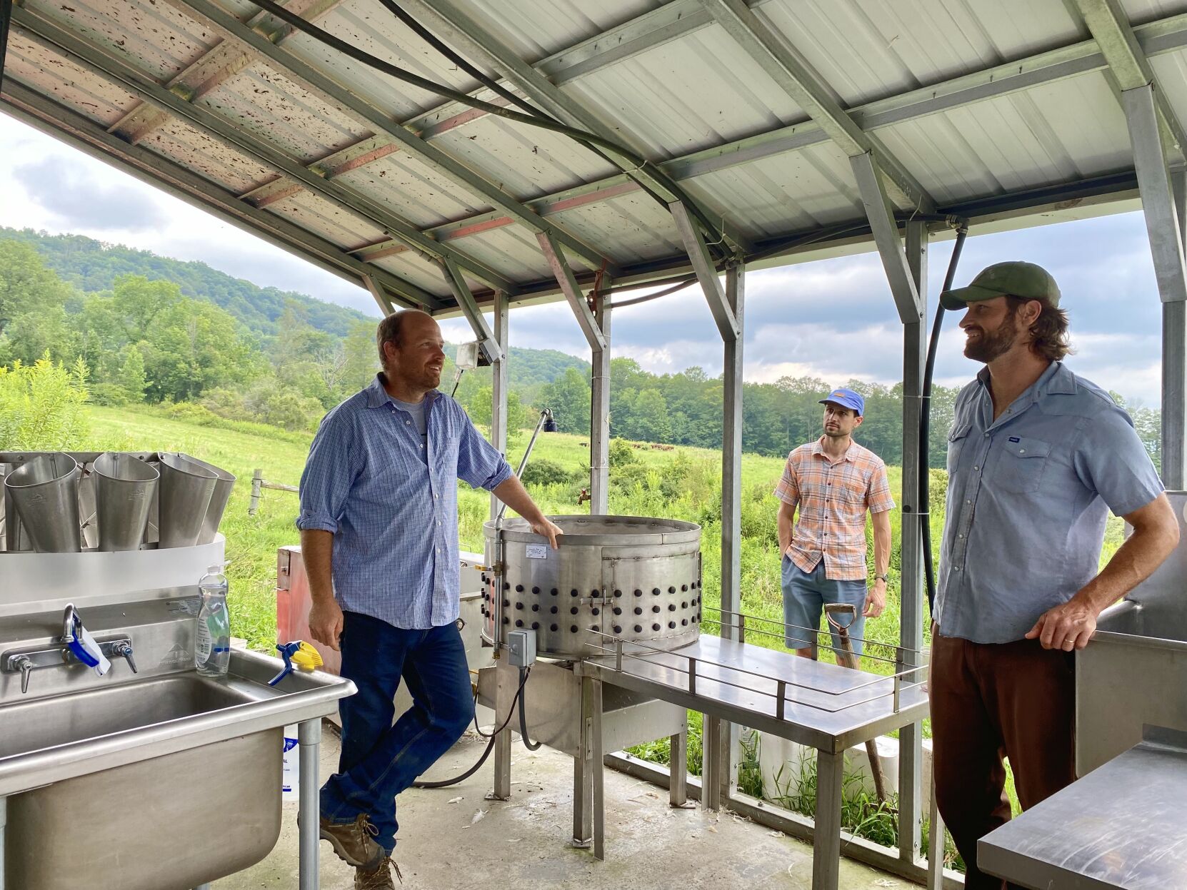 Men talk at a farm